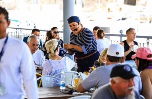 a group of people sitting at a table