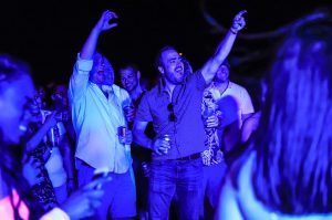 a group of people partying on a boat