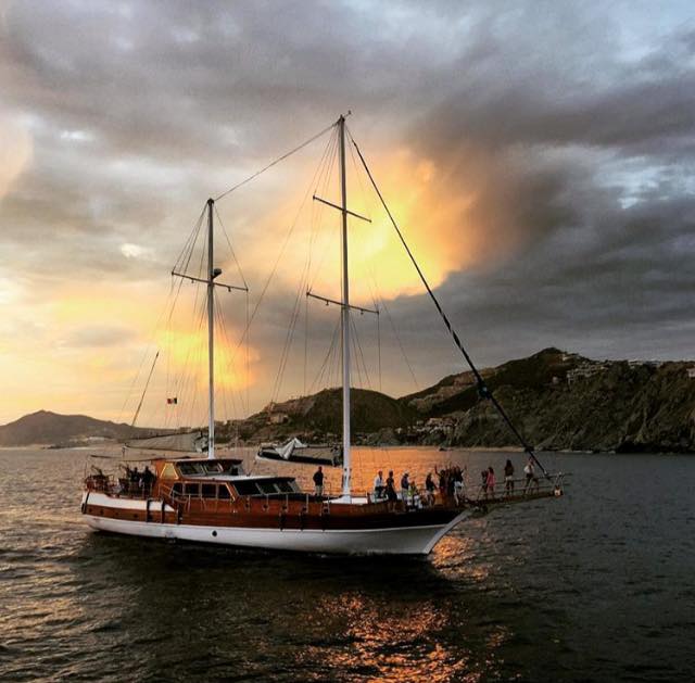 WildCaboTours – Relaxing 3 a small boat in a large body of water