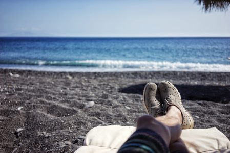 a person sitting on a beach
