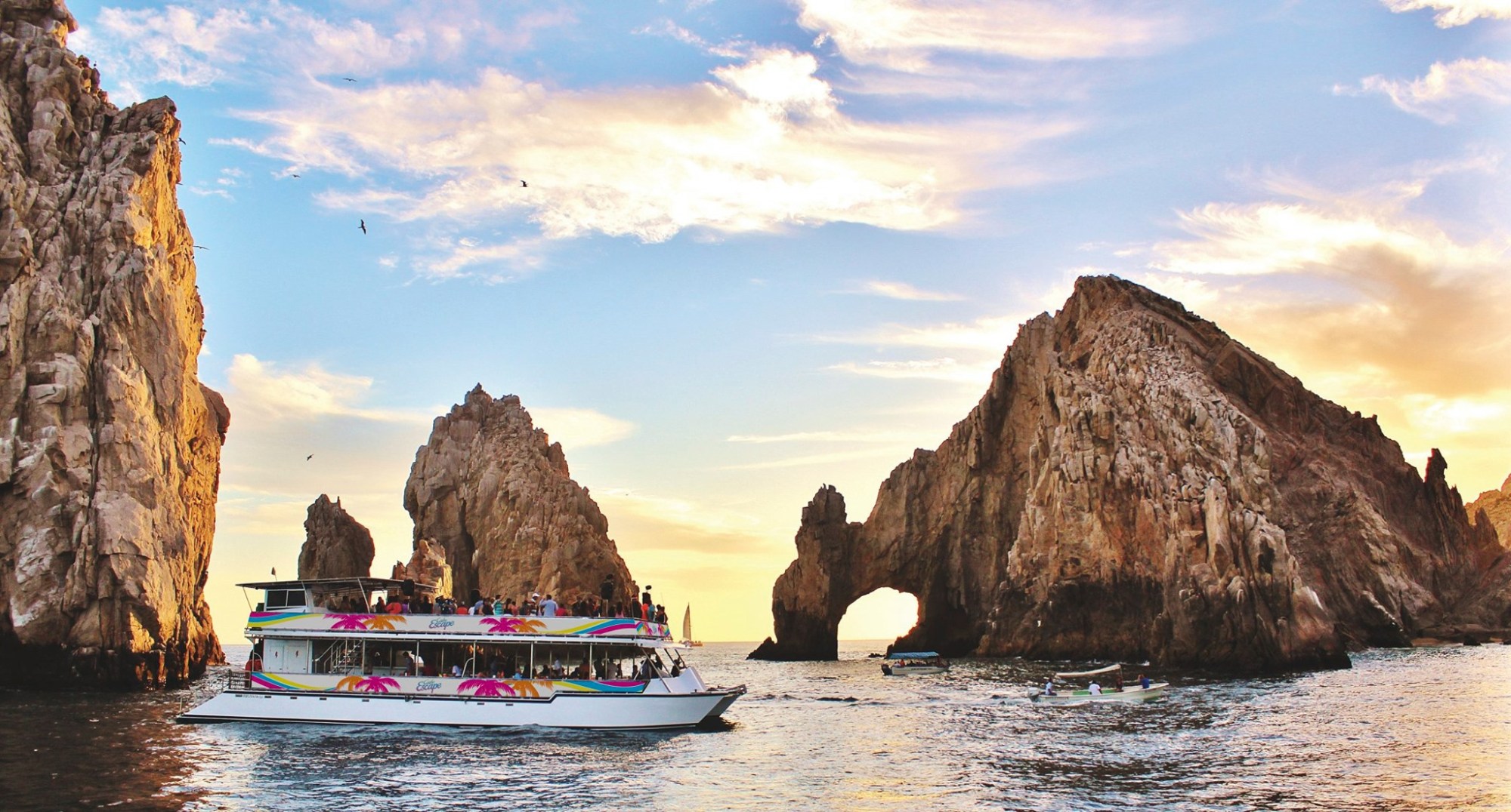 WildCaboTours – Off Season 4 a large body of water with a mountain in the background